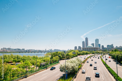 Yeouido modern cityscape and Han river park in Seoul, Korea