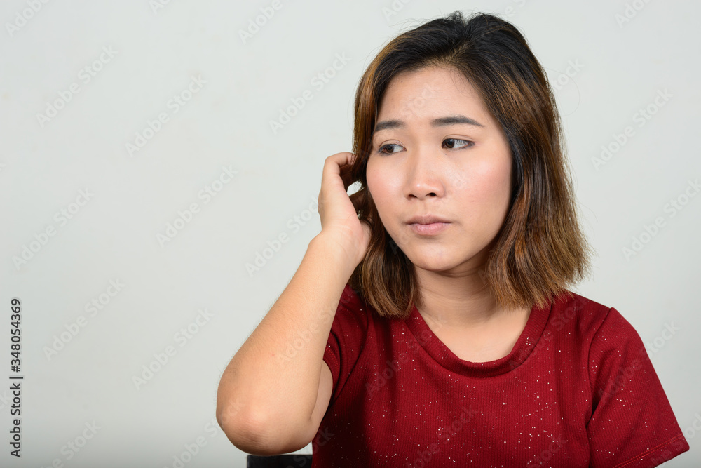 Portrait of young Asian woman with short hair Portrait of young Asian woman with short hair