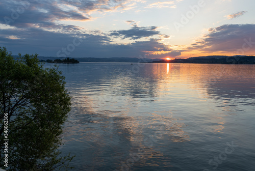 Stunning sunset on the shores of the Upper Zurich Lake  Obersee   near Rapperswil  St. Gallen  Switzerland