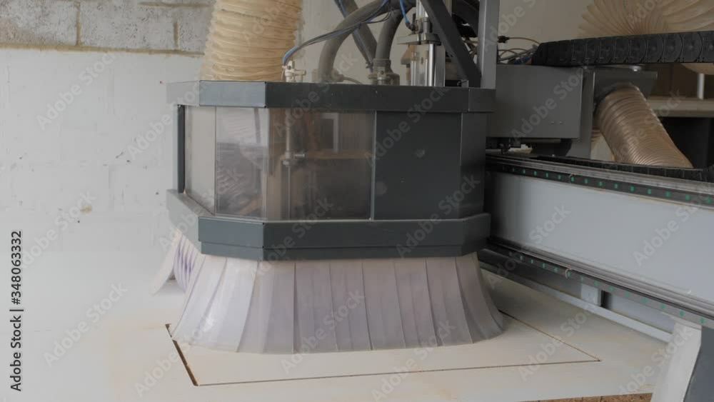 CNC Router machine cutting the MDF CNC Router machine cutting the MDF