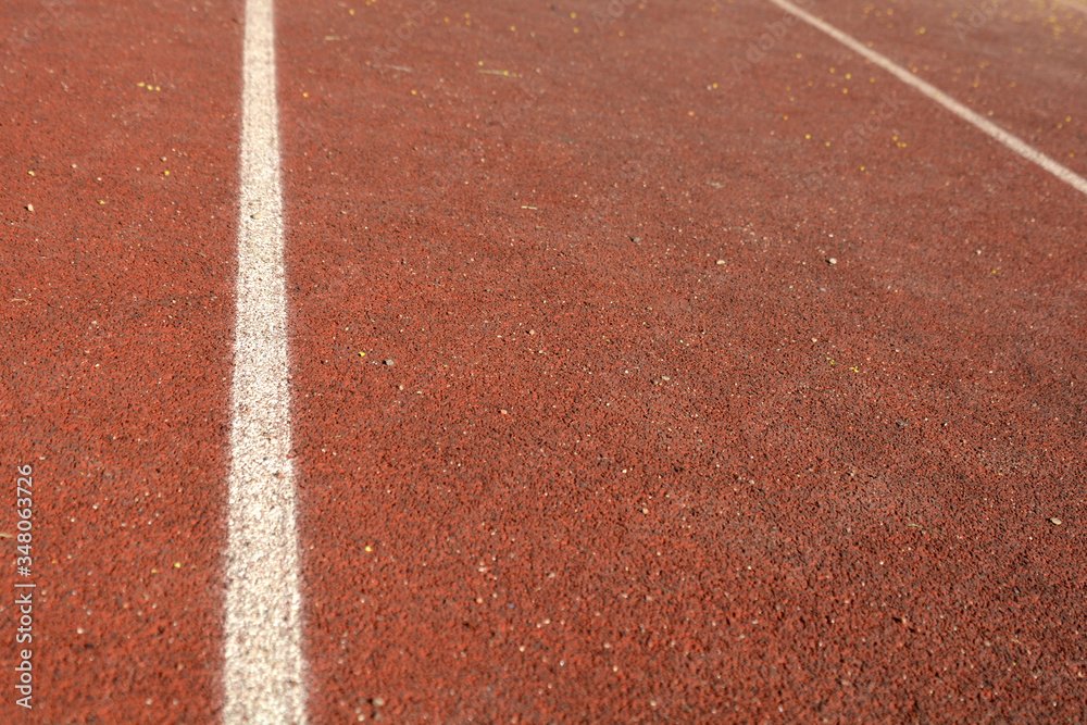 Running track rubber with line. Healthy lifestyle Running track rubber with line. Healthy lifestyle