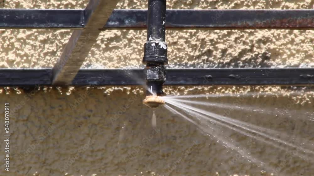 Water system watering garden close up