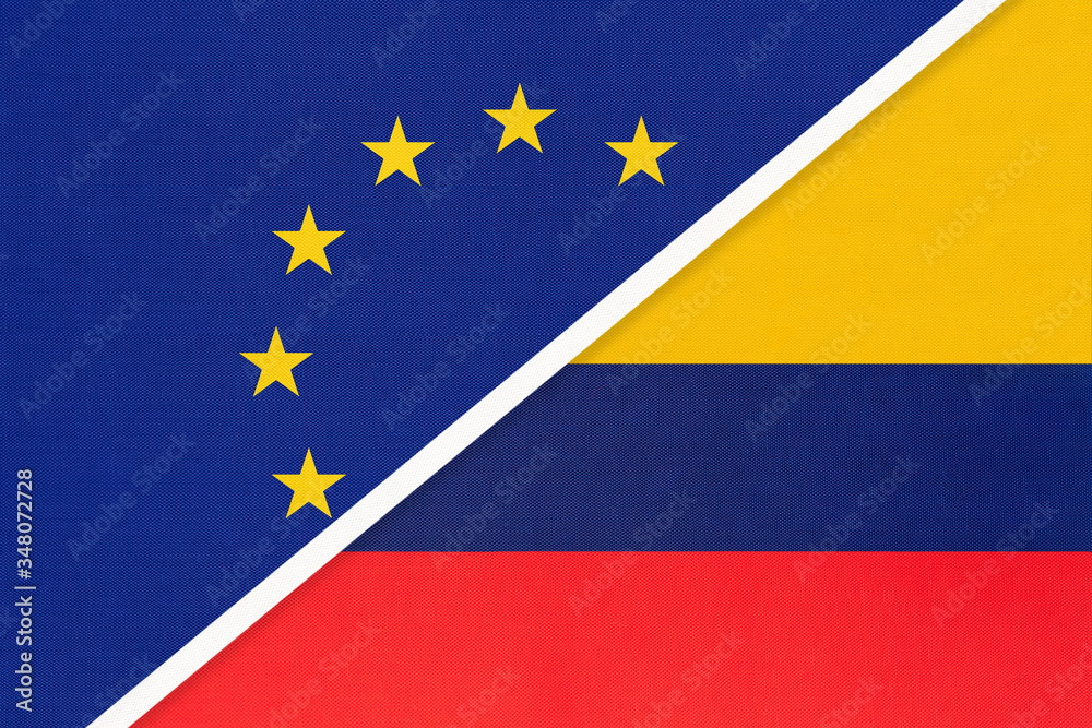 European Union or EU vs Colombia national flag from textile. Symbol of the Council of Europe association. European Union or EU vs Colombia national flag from textile. Symbol of the Council of Europe association.