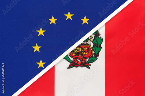 European Union or EU vs Peru national flag from textile. Symbol of the Council of Europe association.