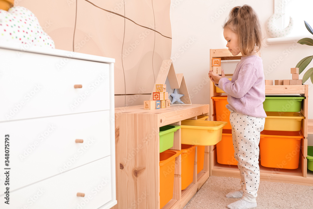 Cute little girl in playroom Cute little girl in playroom