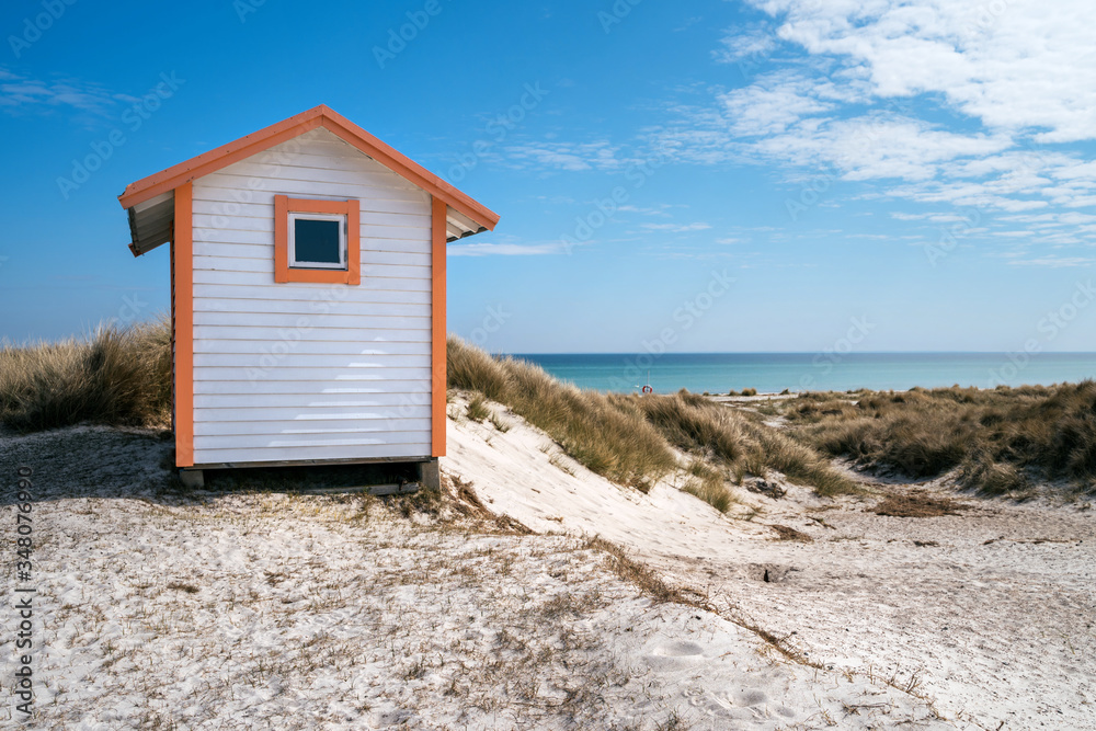 Candy coloured beach hut on Skanor beach in Falsterbo, Skane, Sweden. Swedish tourism concept Candy coloured beach hut on Skanor beach in Falsterbo, Skane, Sweden. Swedish tourism concept