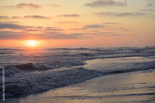 Sunset over the waves at Oceanside Beach