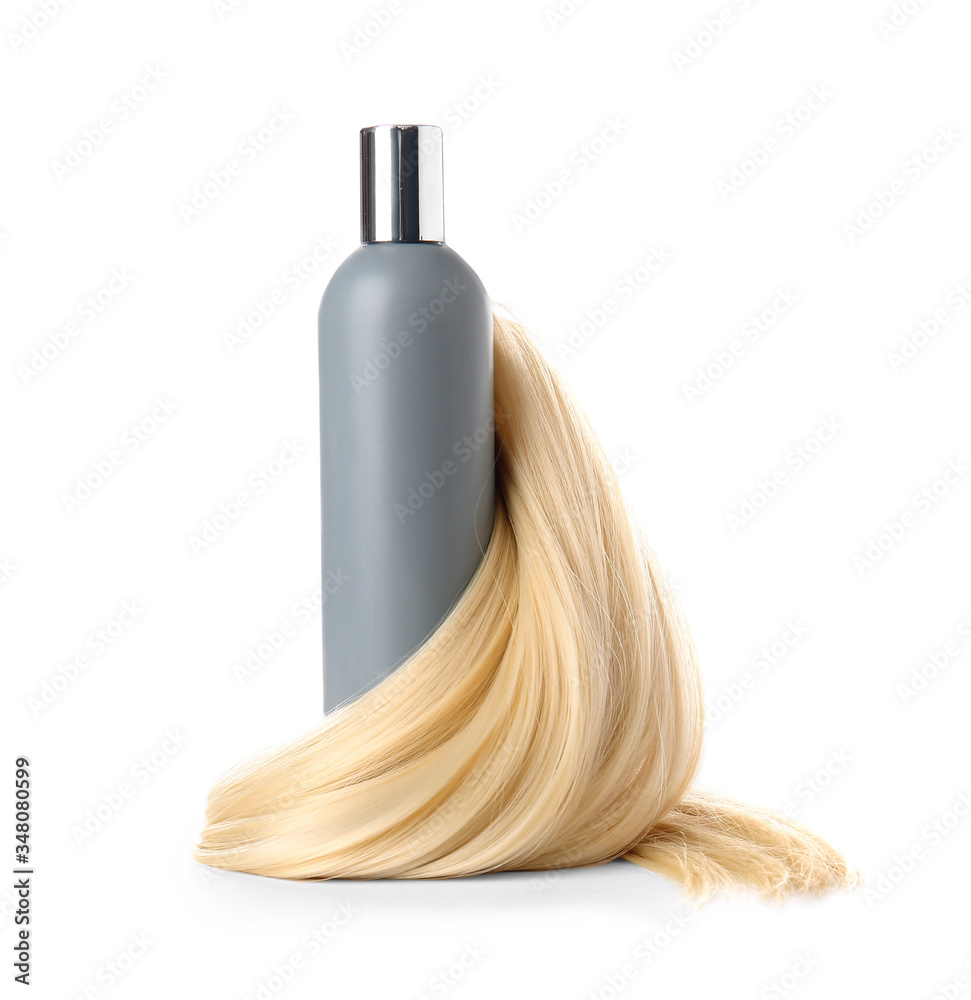 Fototapeta premium Bottle of shampoo for blonde hair on white background