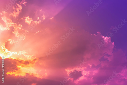 Purple pink and orange explosion light with sunset on dark twilight sky