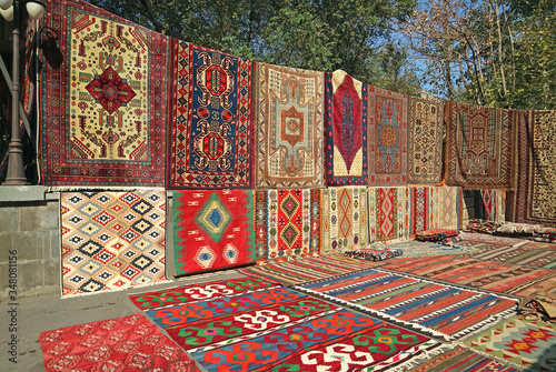Various Patterns of Carpets for Sale at Vernissage Market in Downtown Yerevan, Armenia © jobi_pro
