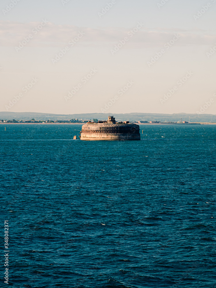 Panoramic view on the buildings of Portsmouth from the cruise ship in ocean