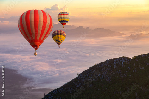Colorful hot-air balloons flying over the Doi Luang Chiang Dao