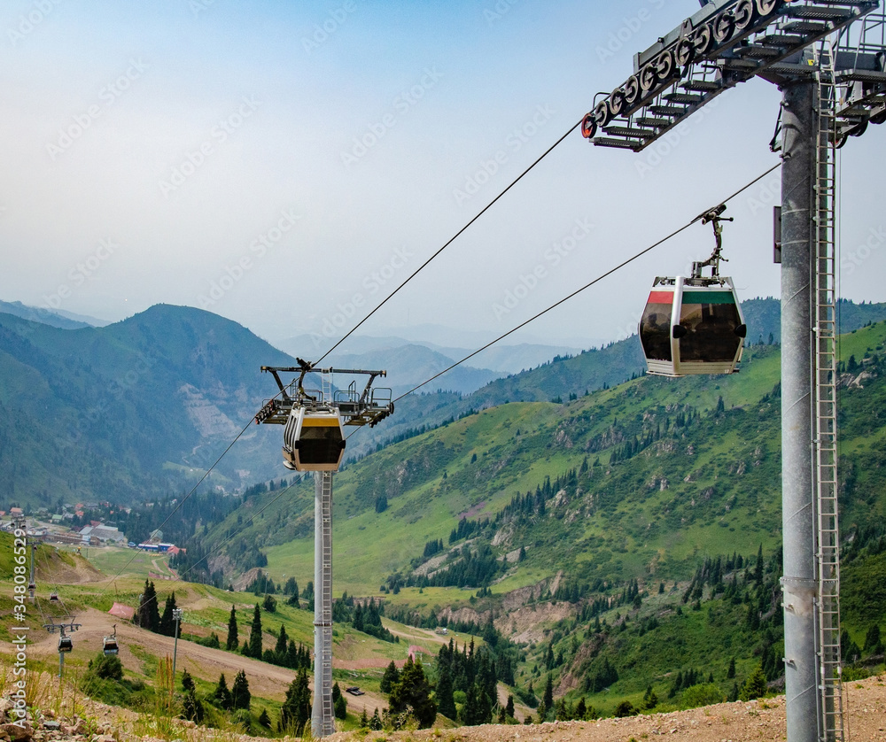 Obraz cableway in the mountains to view landscapes for tourists and people