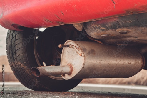 Obraz na plátne Car exhaust (muffler) fallen off a car