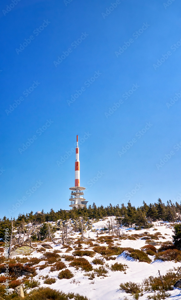 Radio antenna tower on the top of the Brocken mountains. Harz National Park in Germany.