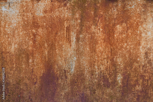 rusty orange metal wall. Background of old metal © SYARGEENKA