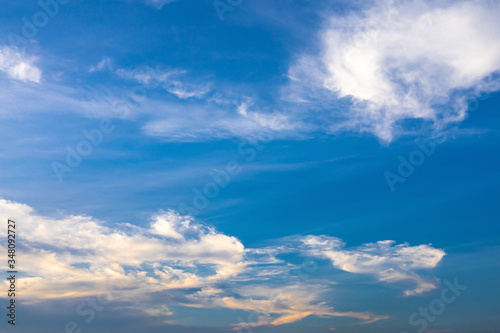Beautiful blue sky with clouds background. © Chaiwat
