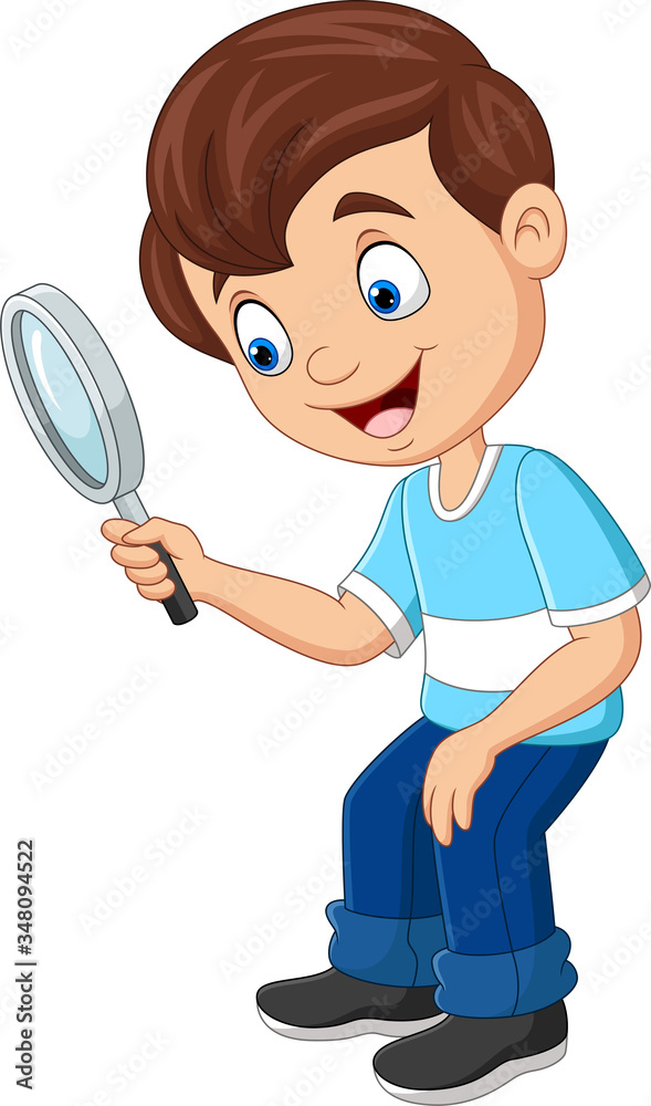 Little boy using a magnifying glass