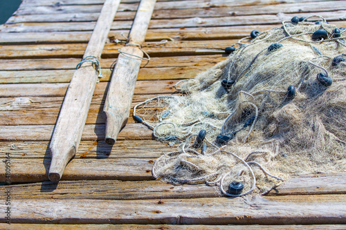 Fishing nets and oars at the top of the old wooden  pier, Dalyan, İztuzu Beach, Turkey.