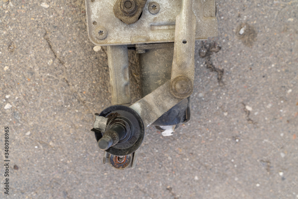The car mechanic works in the garage. Repair. The car mechanic works in the garage. Repair.