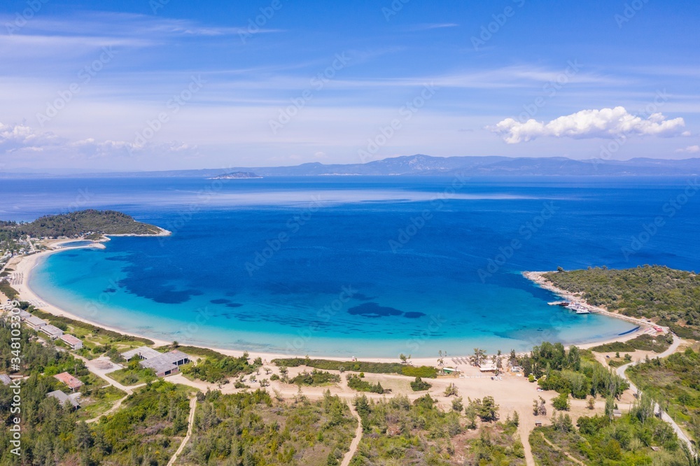Aerial drone view of Paliouri Beach in Kassandra Sithonia penisula  Chalkidiki Greece
