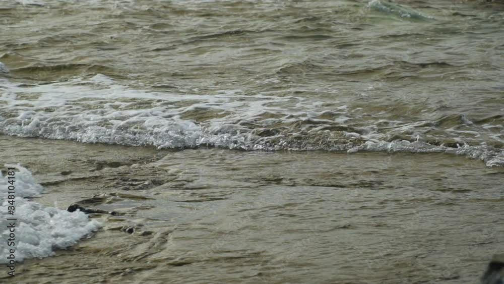 Small tidal waves breaking into each other on shallow rocks, slow motion, Fiji Small tidal waves breaking into each other on shallow rocks, slow motion, Fiji