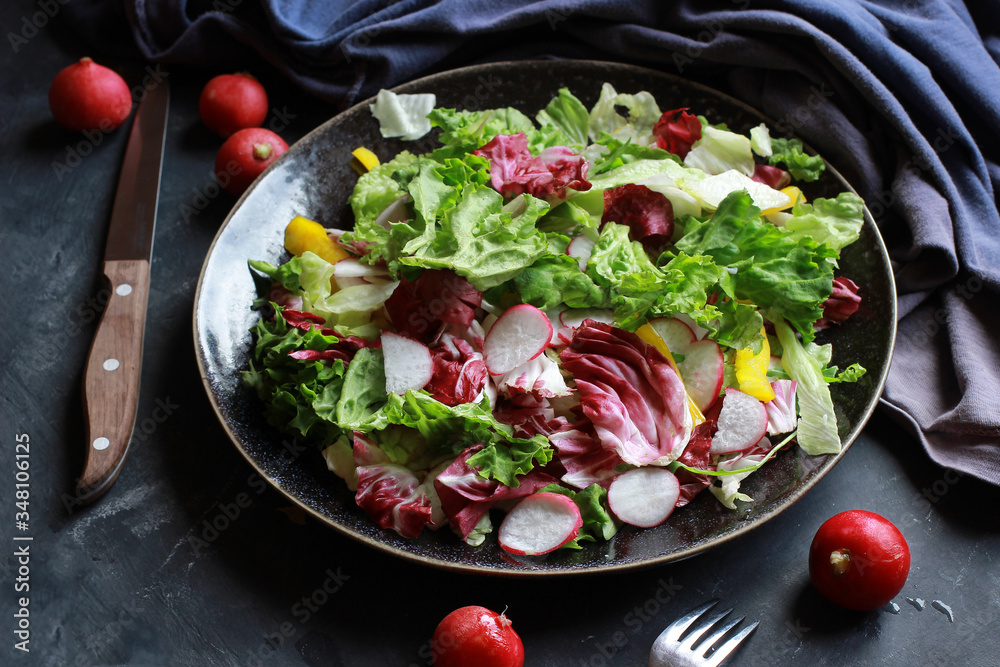 Mix healthy salad romaine,chard,radicchio with radish . Mix healthy salad romaine,chard,radicchio with radish .