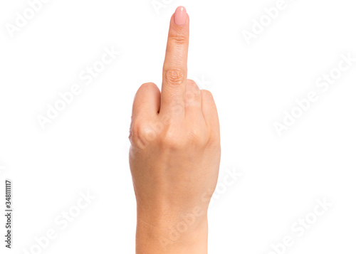 Female hand showing middle finger gesture, isolated on white background. Beautiful hand of woman with copy space.