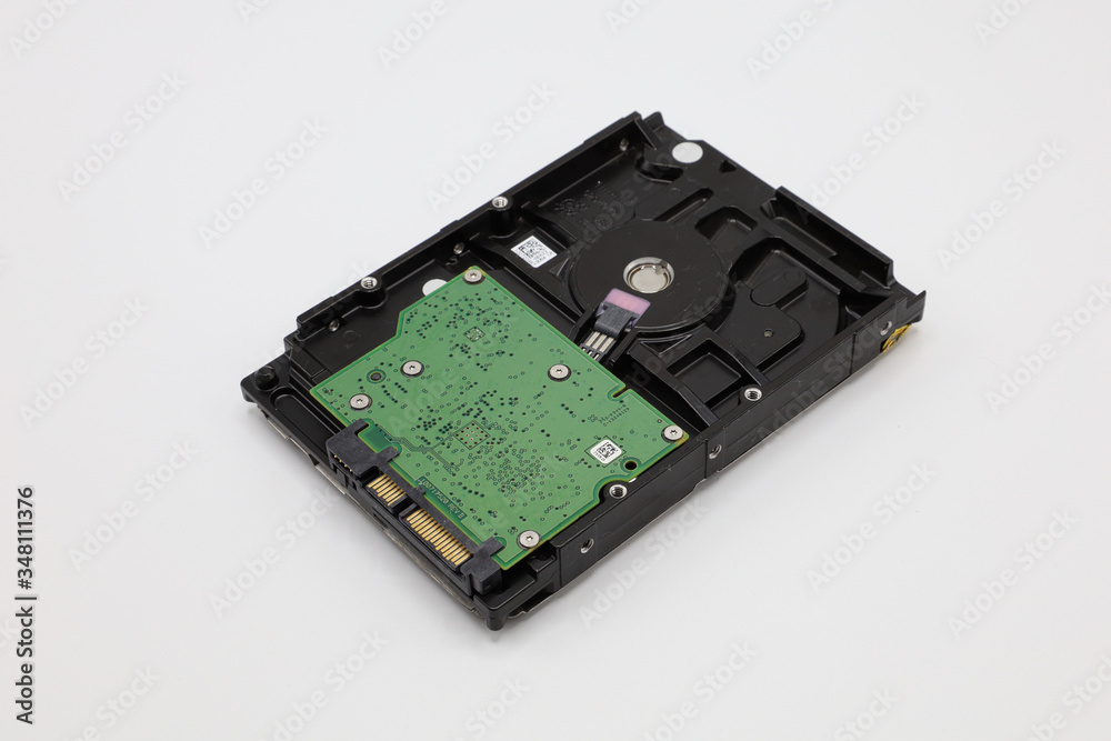 Hard disk isolated on a white background. Computer HDD Hard Disk Drive. Computer Storage Memory. Solid State Drive.
Hard disk isolated on a white background. Computer HDD Hard Disk Drive. Computer Storage Memory. Solid State Drive.