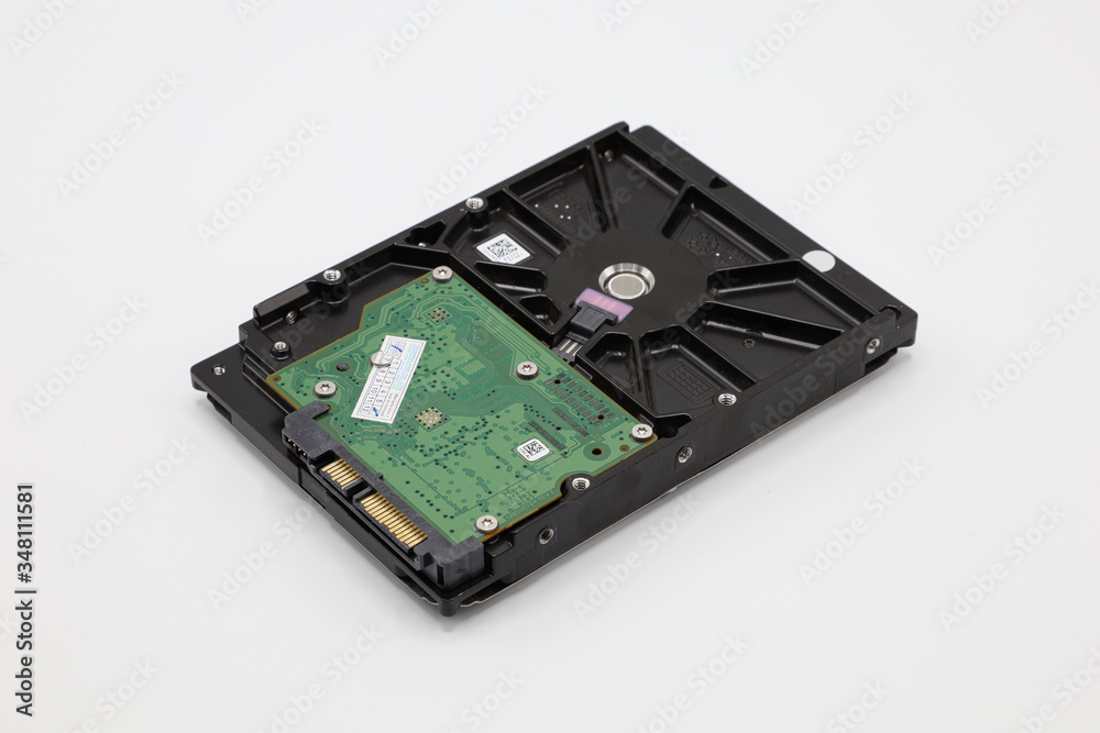 Hard disk isolated on a white background. Computer HDD Hard Disk Drive. Computer Storage Memory. Solid State Drive.
Hard disk isolated on a white background. Computer HDD Hard Disk Drive. Computer Storage Memory. Solid State Drive.