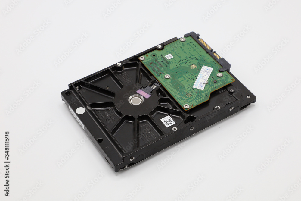 Hard disk isolated on a white background. Computer HDD Hard Disk Drive. Computer Storage Memory. Solid State Drive.
Hard disk isolated on a white background. Computer HDD Hard Disk Drive. Computer Storage Memory. Solid State Drive.
