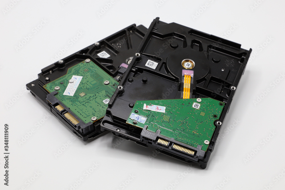 Hard disk isolated on a white background. Computer HDD Hard Disk Drive. Computer Storage Memory. Solid State Drive.
Hard disk isolated on a white background. Computer HDD Hard Disk Drive. Computer Storage Memory. Solid State Drive.