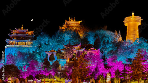 Illuminated Guishan Temple at night, Shangri La, China. photo