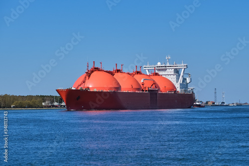 LNG or liquified natural gas tanker enter port on a sunny day in Klaipeda, Lithuania. Alternative gas supply, commercial freight, energy crisis