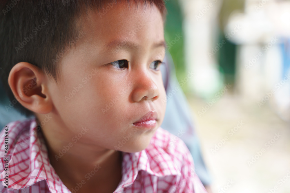 Asian boy with sadness serious expression Asian boy with sadness serious expression