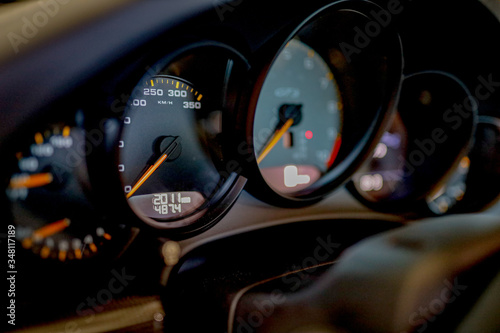 Photo speedometer close up of a black Porsche GT3