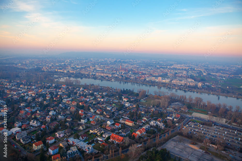 city rooftops of Vienna , aerial view of city and Danube river 