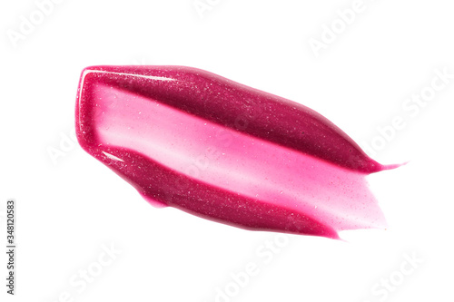 Close-up of make-up swatch. Smear of shiny pink lip gloss