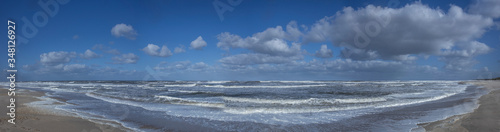 Northsea coast. Beach and waves. Clouds. Panorama. Julianadorp Netherlands