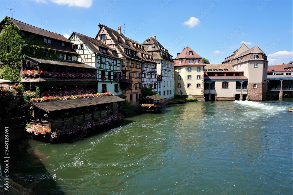 Old half-timbered houses in Strasbourg. Summer Sunny urban landscape Old half-timbered houses in Strasbourg. Summer Sunny urban landscape