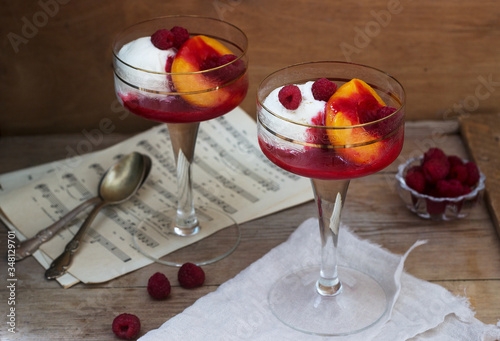 Quadro su tela Ice cream, peach and raspberry sauce dessert dedicated to Australian opera singer Melba