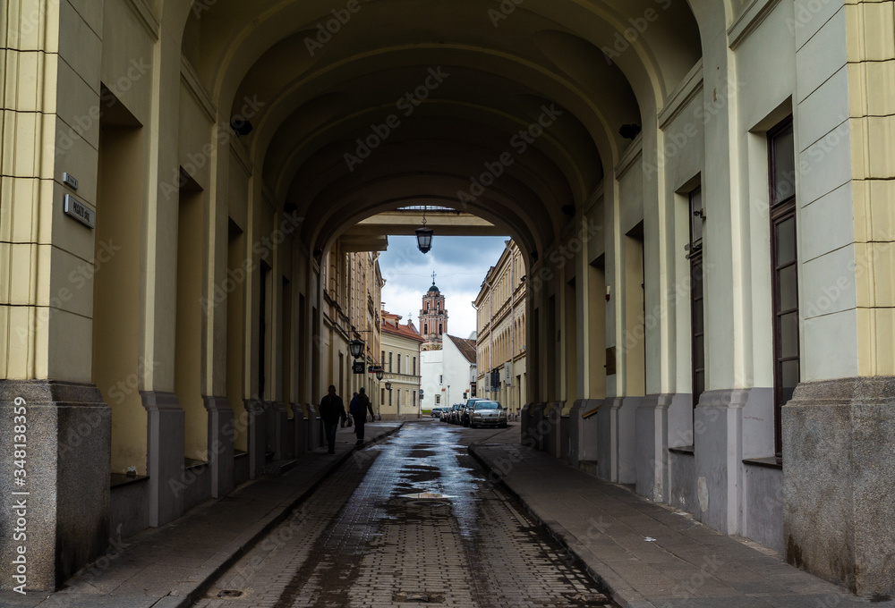Obraz premium April 26, 2018 Vilnius, Lithuania. Passers-by on one of the streets in the center of Vilnius.
