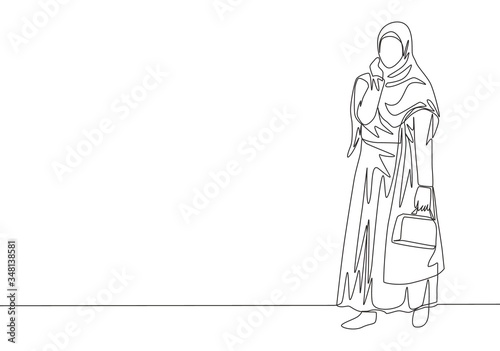 One single line drawing of young happy muslimah bringing little bag and go to shopping. Beautiful Asian woman model in trendy hijab fashion concept continuous line draw design vector illustration
