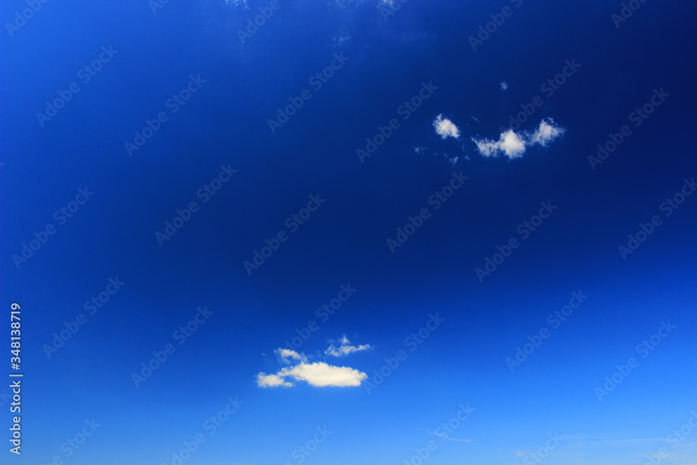 Small clouds on clear blue sky Small clouds on clear blue sky