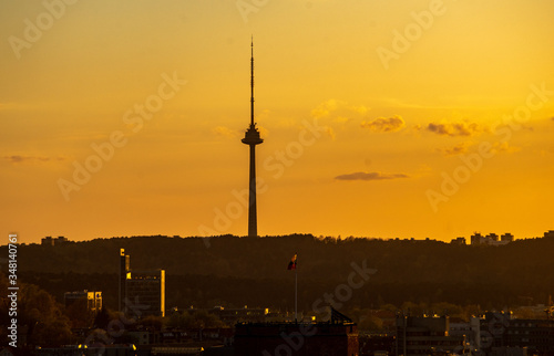 The silhouette of the Vilnius TV tower against the sunset sky.