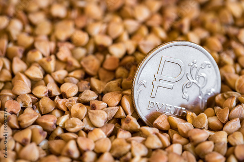 one ruble coin in buckwheat photo