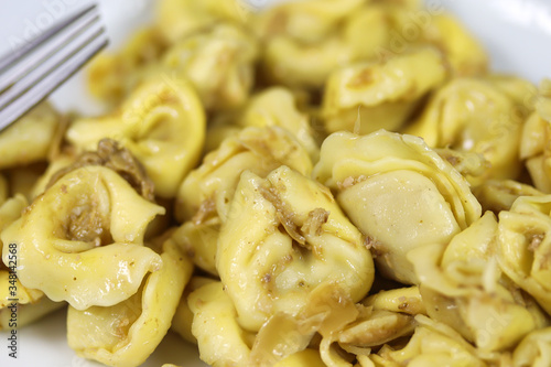 plate of tortellini on a table