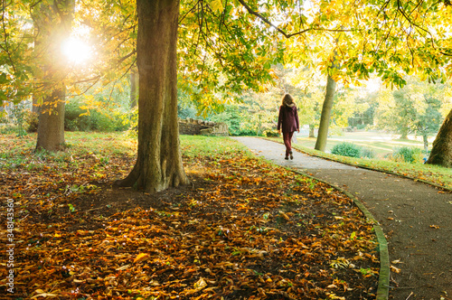 Canvas Print Woman Walking In Park During Autumn