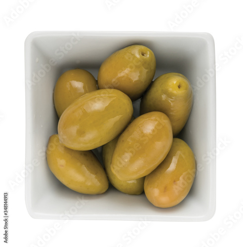 beautiful olives from Cerignola - appetizer of vegetables in olive oil. Homemade preserves as a side dish or aperitif photo