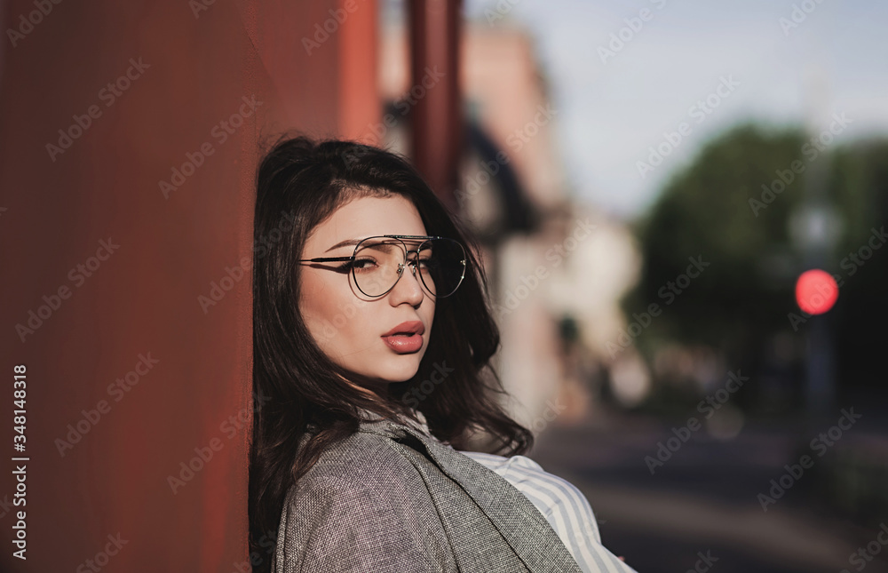 Fototapeta premium Stylish woman with full lips in glasses
